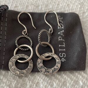 Silpada sterling silver 3 ring drop earrings.
Signed. Made in India